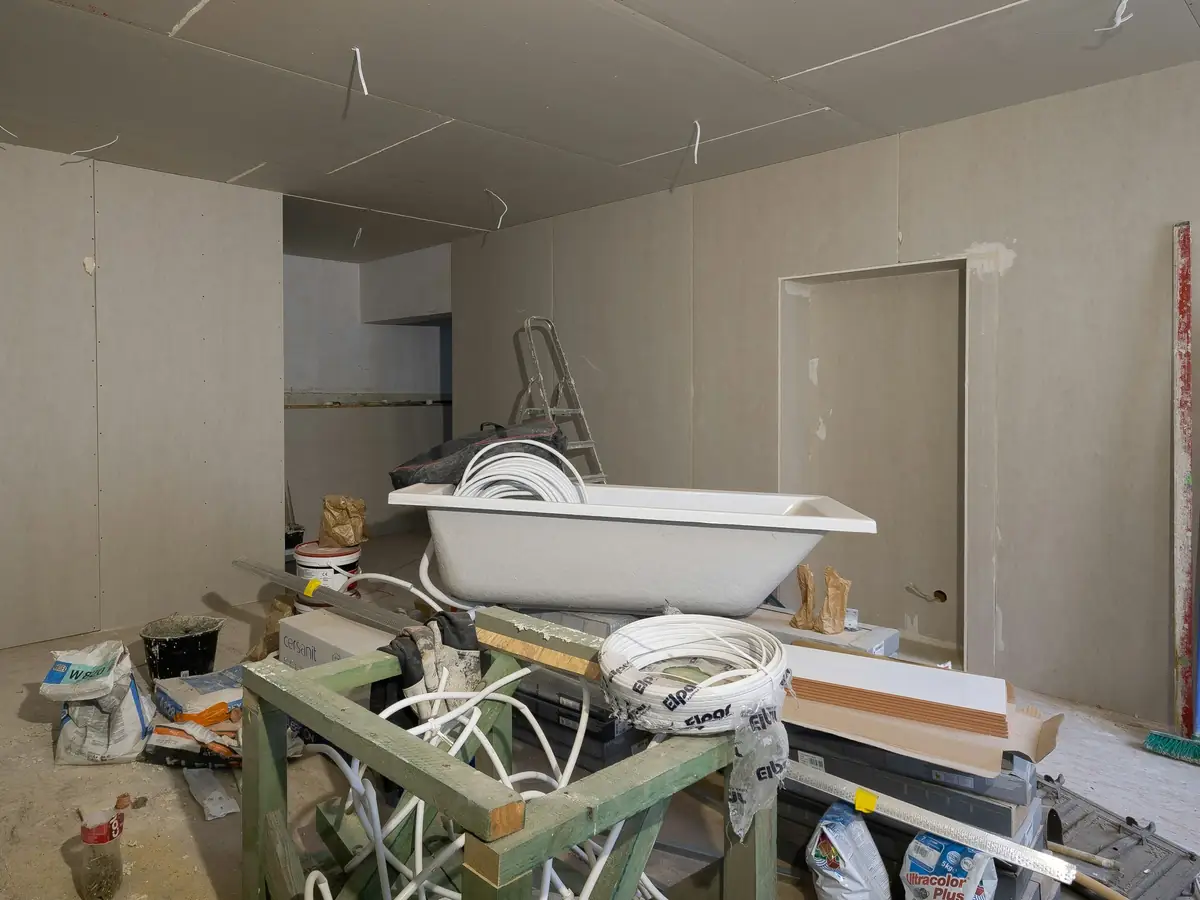 Before: the bathroom mid-build, full of materials